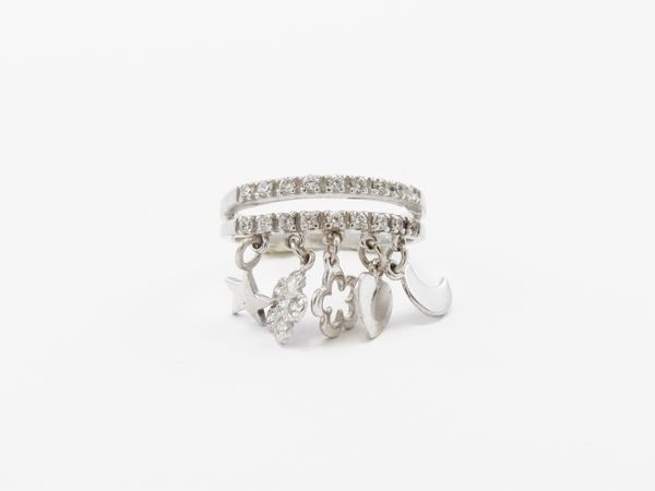 Anello in oro bianco con zirconie cubiche  - Asta Gioielli e orologi - Associazione Nazionale - Case d'Asta italiane