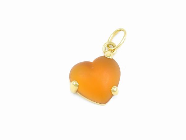 Pendente a cuore Pomellato in oro giallo e pasta vitrea arancio  - Asta Gioielli e orologi - Associazione Nazionale - Case d'Asta italiane