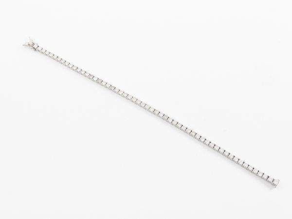 Bracciale tennis in oro bianco con diamanti  - Asta Gioielli e orologi - Associazione Nazionale - Case d'Asta italiane