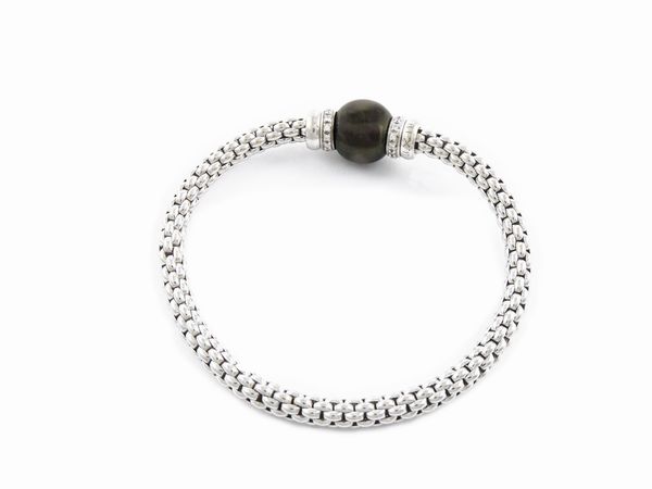 Bracciale flessibile Fope in oro bianco con diamanti e perla coltivata Tahiti  - Asta Gioielli e orologi - Associazione Nazionale - Case d'Asta italiane