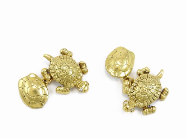 Coppia di gemelli animalier in oro giallo e diamanti  - Asta Gioielli e orologi - Associazione Nazionale - Case d'Asta italiane