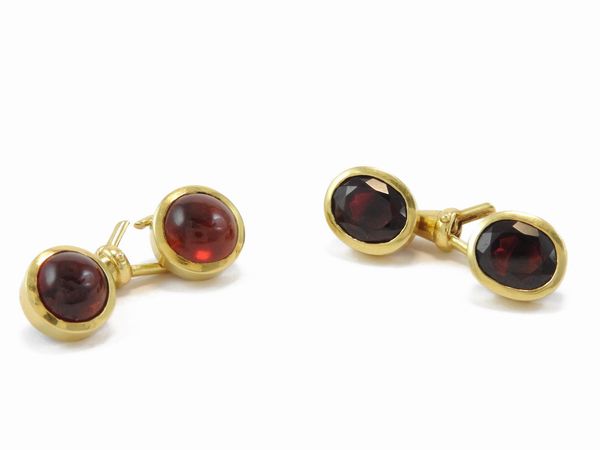 Coppia di gemelli in oro giallo con granati  - Asta Gioielli e orologi - Associazione Nazionale - Case d'Asta italiane
