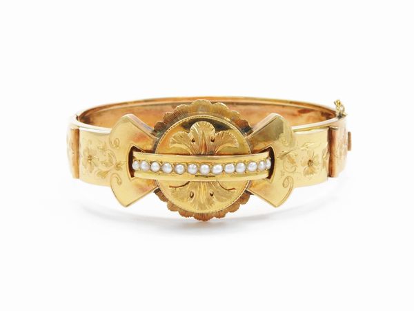 Bracciale rigido in oro rosa con microperle  - Asta Gioielli e orologi - Associazione Nazionale - Case d'Asta italiane