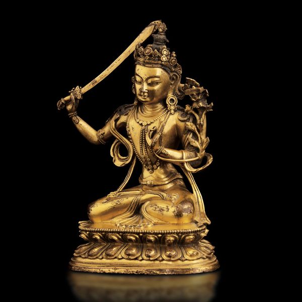 Figura di divinit� con spada in bronzo dorato, Cina, Dinastia Qing, XVIII secolo  - Asta Fine Chinese Works of Art - Associazione Nazionale - Case d'Asta italiane