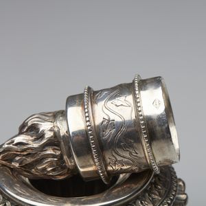 ARGENTIERE FRANCESE DEL XIX SECOLO : Tripode in argento con corpo a torchon e fiamma sulla sommit�, poggiante su piedi caprini  - Asta Asta 401 | ARTE ANTICA E DEL XIX SECOLO Online - Associazione Nazionale - Case d'Asta italiane