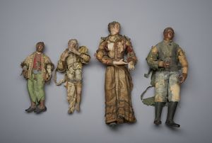 MANIFATTURA NAPOLETANA DEL XIX SECOLO - Quattro figure da presepe in terracotta e tessuto