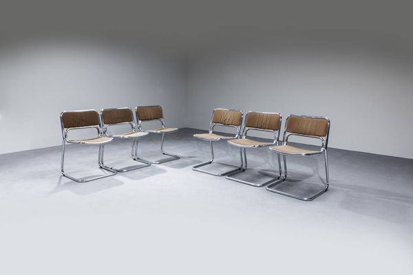 PRODUZIONE ITALIANA : Sei sedie in acciaio cromato  schienale e seduta in tessuto.  Anni '70 cm 76 5x50 5x51  Difetti  - Asta Design - Associazione Nazionale - Case d'Asta italiane