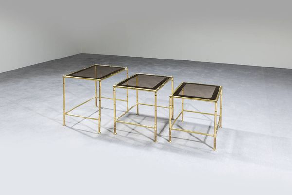 PRODUZIONE ITALIANA : Tre tavolini con struttura in ottone e piano in vetro.  Anni '70 cm 46x39x52 cm 42 5x47x38 cm 38 7x42 5x36 5  - Asta Design - Associazione Nazionale - Case d'Asta italiane