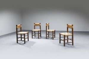 CHARLOTTE PERRIAND  nello stile di : Quattro sedie in legno  sedili e schienali in paglia.  Anni '60 cm 86x41x41  - Asta Design - Associazione Nazionale - Case d'Asta italiane