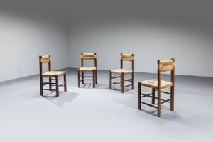 CHARLOTTE PERRIAND  nello stile di : Quattro sedie in legno  sedili e schienali in paglia.  Anni '60 cm 86x41x41  - Asta Design - Associazione Nazionale - Case d'Asta italiane