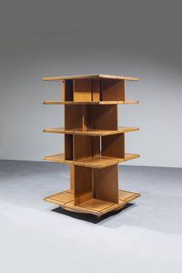 PRODUZIONE ITALIANA - Libreria girevole in legno. Anni '70 cm 166x85x85