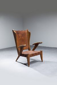 Guglielmo Pecorini - Poltrona in legno con seduta in cuoio.  Ideata per la VII Triennale di Monza del 1937. Prod. Italia 1937 cm 105  [..]