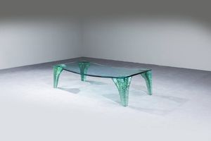 DANNY LANE - Grande tavolo basso mod.Atlas con sostegni in vetro scalpellato e piano in cristallo curvato.  Prod. Fiam 1990  [..]