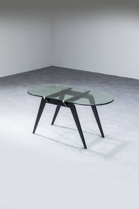 PRODUZIONE ITALIANA - Tavolino con struttura in legno e piano in vetro. Anni '50 cm 47x95 5x47