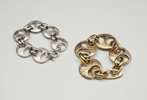 . - Due bracciali in argento 925 rodiato in oro giallo e bianco trasformabili in collana, by 'Pitti e Sisi'.