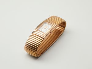 WINTEX - Orologio in acciaio dorato con maglia elastica con movimento al quarzo.