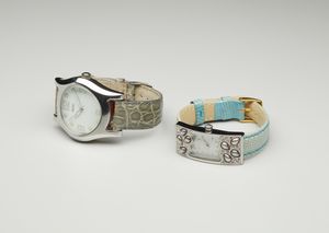 WINTEX - Due orologi in metallo cromato e dorato con cinturini in ecopelle