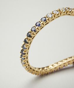 . : Bracciale modello tennis rainbow in oro giallo 18 carati e zaffiri multicolore di 4.60 ct.  - Asta Asta 402 | GIOIELLI - OROLOGI Online - Associazione Nazionale - Case d'Asta italiane