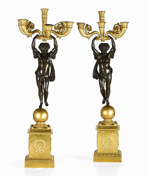 Coppia di grandi candelabri. Bronzo fuso, cesellato, patinato e dorato. Francia XIX secolo  - Asta Dimore italiane - Associazione Nazionale - Case d'Asta italiane