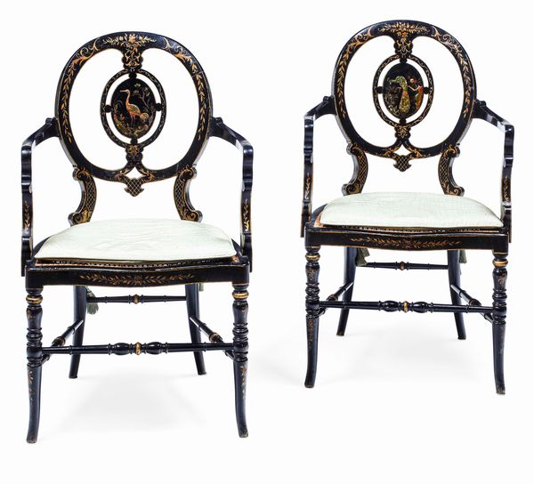 Coppia di sedie con braccioli in legno ebanizzato. XIX secolo  - Asta Dimore italiane - Associazione Nazionale - Case d'Asta italiane