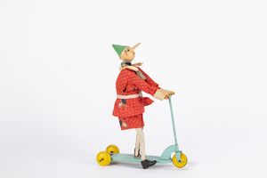 Sigi : Pinocchio su triciclo  - Asta Giocattoli d'Epoca - Associazione Nazionale - Case d'Asta italiane
