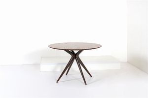 MOLTENI ANGELO - Tavolo con piano in legno di teak, sostegno in legno scuro.Anni '50Etichetta cartacea del produttore sotto il  [..]