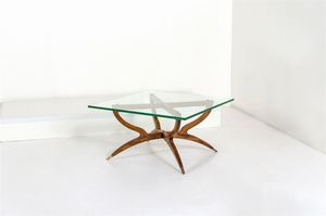 PRODUZIONE ITALIANA - Tavolino con struttura in legno, terminali in ottone, piano in cristallo molato di forte spessore.Anni '50cm 4 [..]