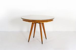 BUFFA PAOLO, nello stile di - Tavolo rotondo in legno verniciato.Anni '50cm 74x90