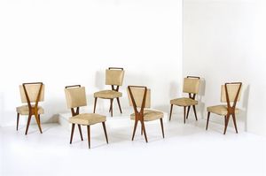 VIGORELLI GIANNI - Sei sedie con struttura in legno di noce, sedili e schienali imbottiti rivestiti in skai, terminali in ottone.Anni  [..]