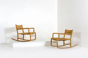 Rambaldi Emanuele - Due sedie a dondolo in legno con sedile e schienale in paglia.Prod. Chiavari, Liguria anni '50cm  73x94x54
