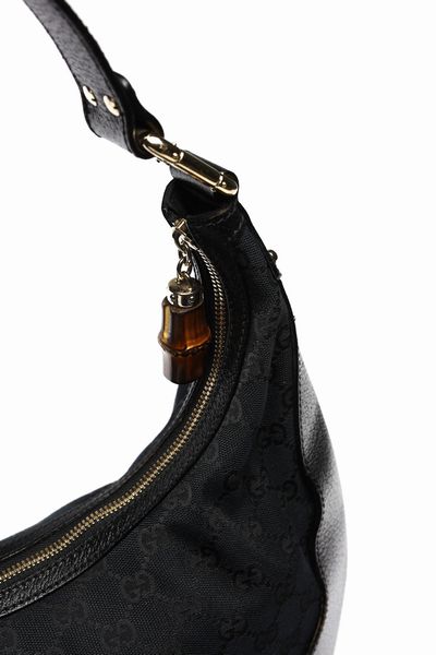 GUCCI : Borsa Gucci logo nera e dettagli bamb�.  - Asta 04/05/2023 | FASHION LUXURY - ALTA MODA, BORSE E ACCESSORI DI LUSSO Online - Associazione Nazionale - Case d'Asta italiane
