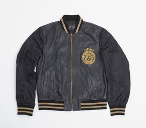 VERSACE GIANNI (1946 - 1997) - Bomber in nappa e tessuto tecnico nero.