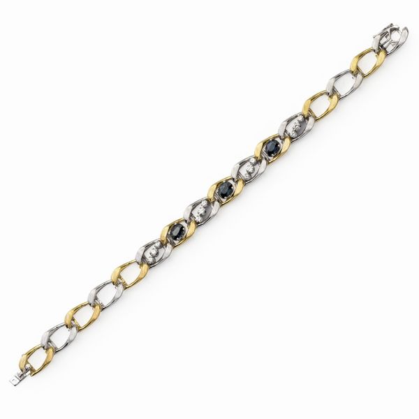 Bracciale in oro giallo e bianco satinato 18kt  - Asta Gioielli Orologi e Fashion Vintage - Associazione Nazionale - Case d'Asta italiane