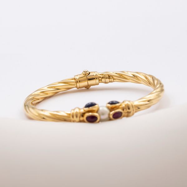 Bracciale a manetta in oro giallo 18kt  - Asta Gioielli Orologi e Fashion Vintage - Associazione Nazionale - Case d'Asta italiane