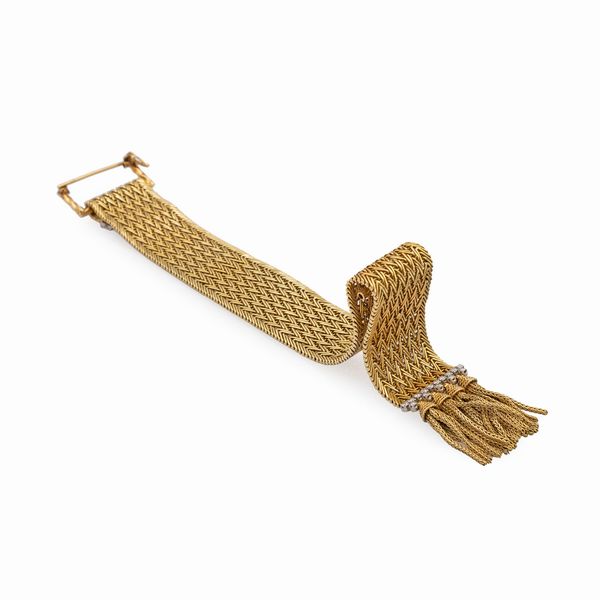 Bracciale a tessuto in oro giallo 18kt  - Asta Gioielli Orologi e Fashion Vintage - Associazione Nazionale - Case d'Asta italiane