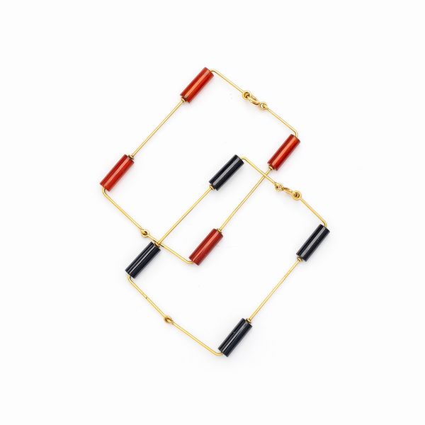 Coppia di bracciali a manetta in oro giallo 18kt  - Asta Gioielli Orologi e Fashion Vintage - Associazione Nazionale - Case d'Asta italiane