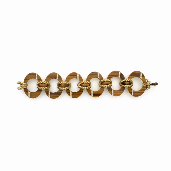 Bulgari bracciale in oro giallo 18kt e occhio di tigre  - Asta Gioielli Orologi e Fashion Vintage - Associazione Nazionale - Case d'Asta italiane