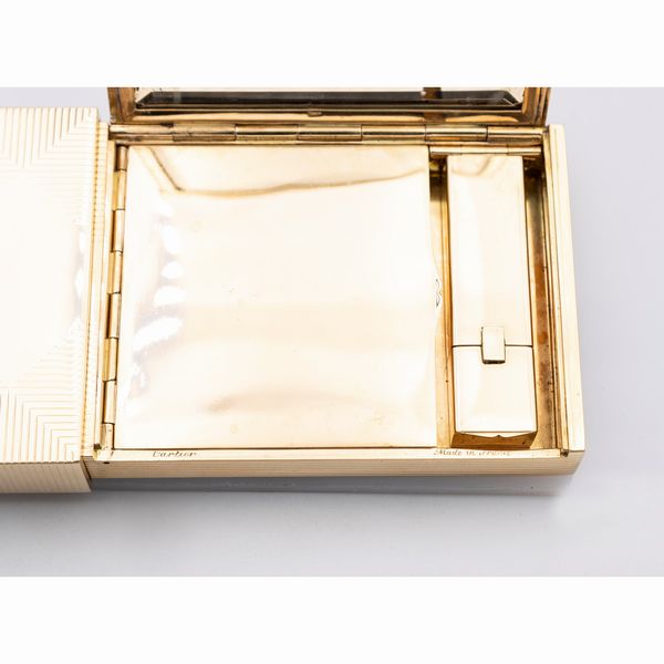 Cartier, trousse in oro giallo 18kt  - Asta Gioielli Orologi e Fashion Vintage - Associazione Nazionale - Case d'Asta italiane