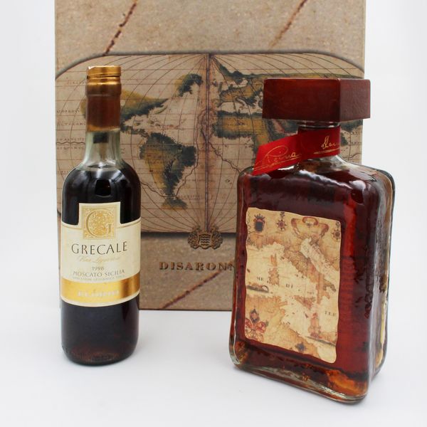COFANETTO CON GRECALE FLORIO E DISARONNO, IILVA  - Asta VINI E DISTILLATI PREGIATI E DA COLLEZIONE - Associazione Nazionale - Case d'Asta italiane