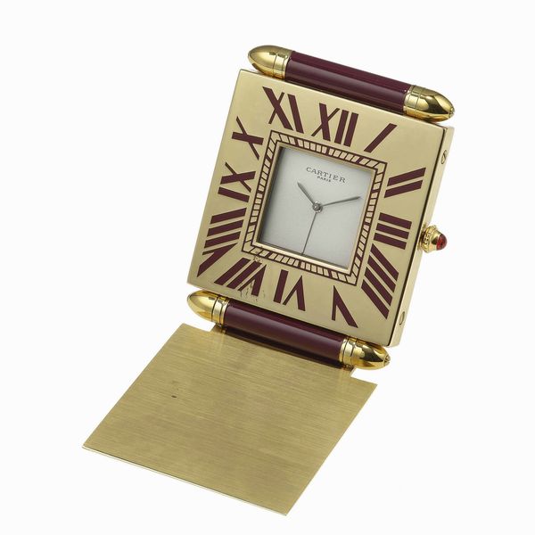 Cartier. Sveglietta da viaggio Carr Obus al quarzo  - Asta Fine Jewels - Associazione Nazionale - Case d'Asta italiane