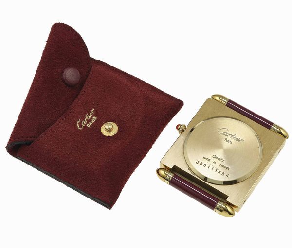 Cartier. Sveglietta da viaggio Carr Obus al quarzo  - Asta Fine Jewels - Associazione Nazionale - Case d'Asta italiane