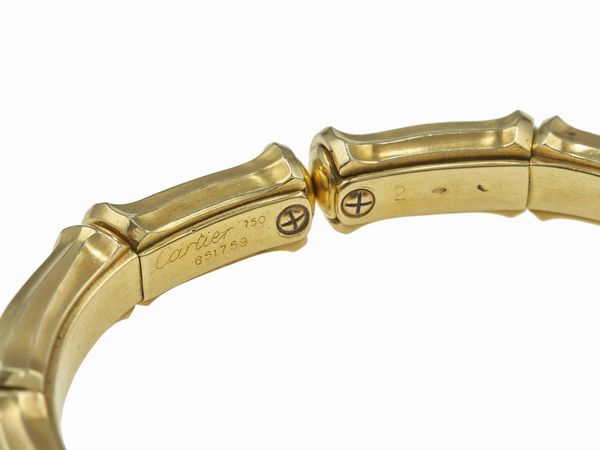 Cartier. Demi-parure Bamboo composta da girocollo e bracciale  - Asta Fine Jewels - Associazione Nazionale - Case d'Asta italiane