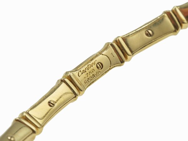 Cartier. Demi-parure Bamboo composta da girocollo e bracciale  - Asta Fine Jewels - Associazione Nazionale - Case d'Asta italiane