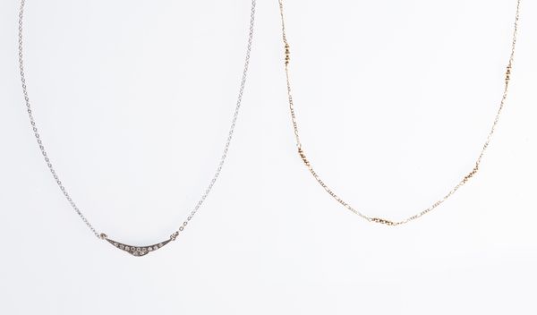 Coppia di girocolli in oro giallo e bianco  - Asta Fine Jewels and Watches - Associazione Nazionale - Case d'Asta italiane