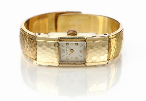 Hermes - orologio con bracciale rigido placcato oro  - Asta Fine Jewels and Watches - Associazione Nazionale - Case d'Asta italiane