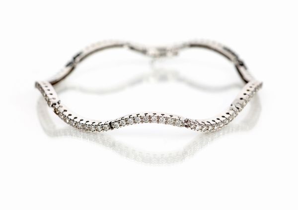 Bracciale tennis in oro e brillanti  - Asta Fine Jewels and Watches - Associazione Nazionale - Case d'Asta italiane