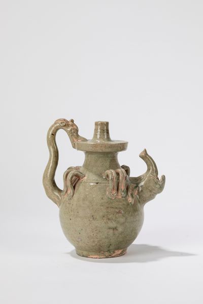 Antico versatoio cinese in ceramica a invetriatura celadon  - Asta Arte orientale - Associazione Nazionale - Case d'Asta italiane