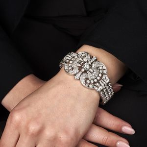 BRACCIALE AD AMPIA FASCIA CON DIAMANTI  - Asta Gioielli - Associazione Nazionale - Case d'Asta italiane