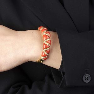 CHANTECLER : CHANTECLER BRACCIALE RIGIDO CON CORALLO E DIAMANTI  - Asta Gioielli - Associazione Nazionale - Case d'Asta italiane