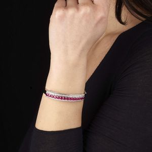 BRACCIALE RIGIDO CON RUBINI E DIAMANTI  - Asta Gioielli - Associazione Nazionale - Case d'Asta italiane